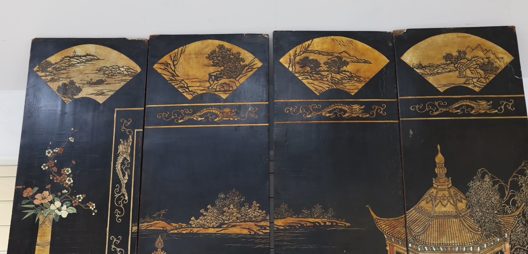 A tall Chinese coromandel lacquer twelve panel screen, 19th century, each leaf panel width 49cm, height 264cm